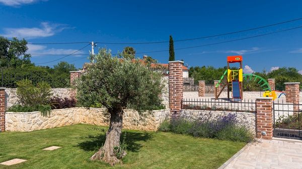 Family Villa Nika with a rustic touch and a pool on Krk